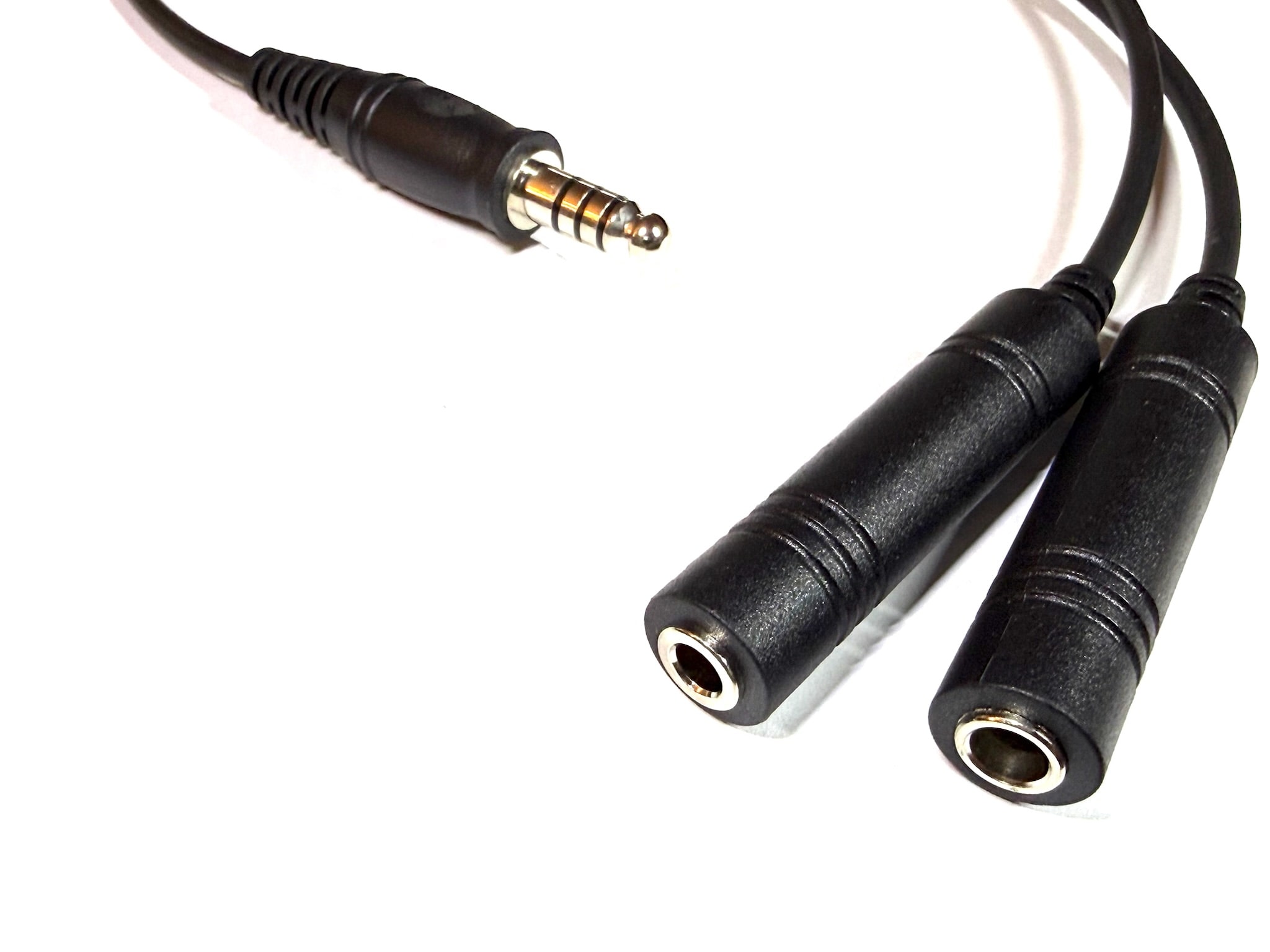 Close-up of the two female GA headset jacks and male A174 plug